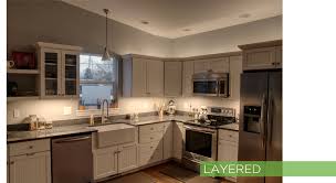 This can sometimes be a bit clunky looking, depending on the execution, but it can also have very elegant in this australian home, the fill in between the top of the cabinets and the ceiling, in a contrasting color that matches the countertop, becomes a design. Lighting Techniques Lighting In Layers