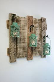The most elegant as well as beautiful. Pallet Wall Decor With Antique Turquoise Metal Lanterns Shabby Chic Decor Home Decor Cabin Decor La Diy Wood Pallet Projects Pallet Wall Decor Pallet Decor