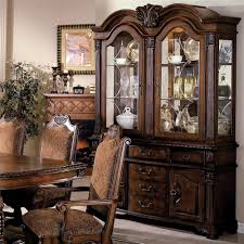 In the 18th century, curios and cabinets were a staple piece of furniture in nearly every traditional dining room. Crown Mark Neo Renaissance Buffet And Hutch With Two Glass Doors Royal Furniture China Cabinets