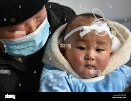 7 month baby in hospital hi-res stock photography and images