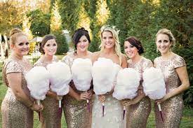 It includes beautiful light pink and white roses; Cotton Candy Bouquets And Other Unconventional Wedding Ideas