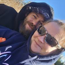 Little Britain road east of elm tree cow grazing in the ditch south side