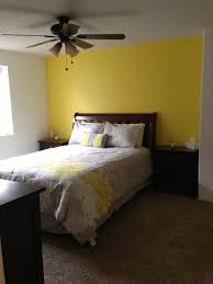 Pin By Jennifer Campbell On Home Projects Yellow Accent Walls Basement Bedrooms Small Basement Bedroom