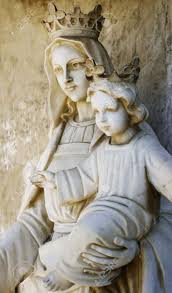 The statue was commissioned for the french cardinal jean de bilhères, who was the french ambassador in rome.the sculpture, in carrara marble, was made for the. Statue Of The Virgin Mary Who Is Holding Baby Jesus Stock Photo Picture And Royalty Free Image Image 10876561