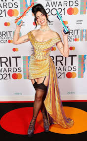 Taylor swift appeared in person to accept her global icon award. Photos From Brit Awards 2021 Red Carpet Fashion E Online