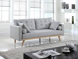 Love the textures in this space; These Leggy Sofas Are Perfect For Small Living Rooms