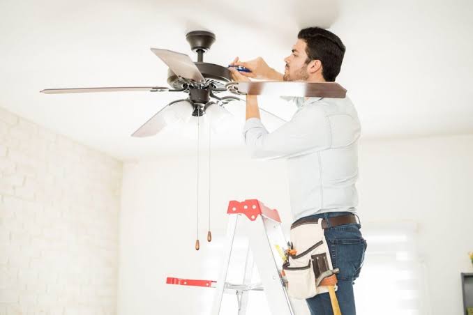 Specialist fitting modern pendant lighting in SE28 home