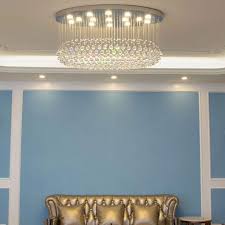 Angle the arms of this highly adjustable fixture to strike a sense of balance that best suits your dining table. Modern Oval Raindrop Crystal Chandelier Elegant Ceiling Light Sofary