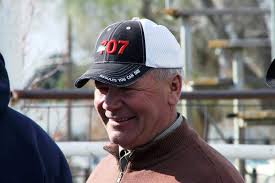 PASSING THE REINS: Cleveland retires from bulldogging school