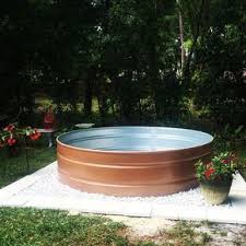 Diy Stock Tank Pool Stay Cool The Budget Decorator Stock Tank Pool Diy Stock Tank Swimming Pool Tank Swimming Pool