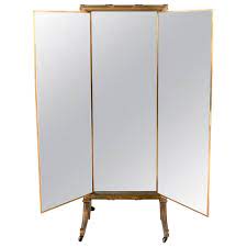 A mirror reflecting a vase. French 3 Way Full Length Triptych Mirror By Miroir Brot Paris At 1stdibs