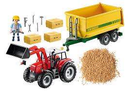 Een traptractor met loskoppelbare aanhanger is ideaal. Grote Tractor Met Aanhangwagen 70131