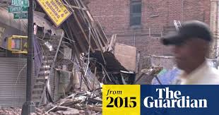 Debris from collapsing building in New York injures passersby
