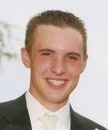 Woman booked in student's death