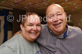 39143724-Big Posh fans Marcina and Dave Coulson. Marcina had her head  shaved at Childers, Whittlesey in aid of Sue Ryder Care.