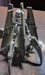 This is an unusual model in comparison to the rest of my collection, in that the model itself is designed with a small and unobtrusive piece of resin to be glued onto the top of the flight stand, which clips onto one of the drop pod's fins while it's in flight mode. Horus Heresy 30k Xii Legion World Eaters Anvillus Dreadclaw 1