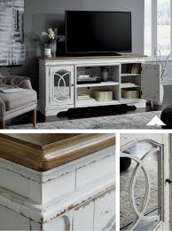 Realyn Chipped White Xl Tv Stand W Fireplace Option From Ashley Furniture Made With Oak And Birch Veneers With Bedroom Tv Stand Tv Stand Decor Tv In Bedroom