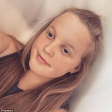 New Zealand girl dies in mother's arms after car crash