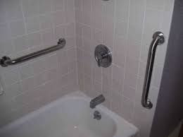 Grab bars are relatively simple to install for experienced home repairers as well as weekenders with the proper tools. Bathtub Shower Grab Bar Installation Carolina Tile Grout And Tub Restoration
