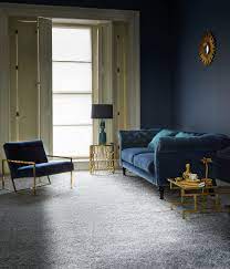 A Grey Carpet Looks Sublime Against A Navy Backdrop With Dark Blue Furniture And Gold Accessories Grey Carpet Living Room Living Room Carpet Blue Furniture