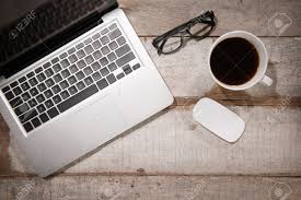 Discover over 1208 of our best selection of related search, hot search, ranking. Work Desk With Laptop Computer Eyeglasses And Hot Coffee Cup Top View Rustic Wooden Table Background With Copy Space In Vintage Toned Stock Photo Picture And Royalty Free Image Image 50022428