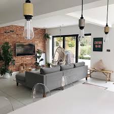 We did not find results for: A Fresh Light And Airy Living Room With Exposed Brick Wall Large Grey Sofa And Patio Brick Living Room Brick Wall Living Room Brick Wall Interior Living Room