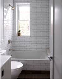 Small Bathroom White Subway Tile With Black Grout White Subway Tile Bathroom Bathroom Tile Designs Patterned Bathroom Tiles