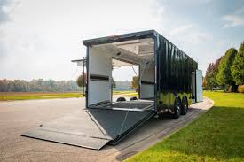 Enclosed trailers intended to both haul vehicles such as race cars, motorcycles, atvs, etc to races and shows while also providing living spaces. Home Cargo Express