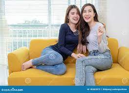 A Couple of Beautiful Asian Woman Talking while Smiling, Same Sex Young  Married Female Couple in Their daily Routine Showing Some Stock Photo -  Image of pretty, life: 180002972