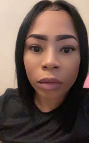 I see crooked eyes and full lips 😂 it may be a stretch but I've seen some  of the other posts