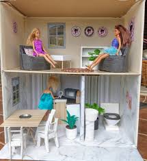 For example an old wooden cube can be easily transformed into a doll. Diy Barbie Dolls House Using Cardboard And A Glue Gun Cecily Paterson Author Editor Writer