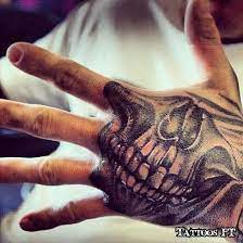 Hand Tattoos For Men Hand Tattoos For Guys Skull Hand Tattoo Hand Tattoo Ideas