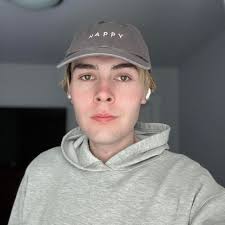 What is the cheapest place for a men's basic haircut in Cochrane, Alberta?