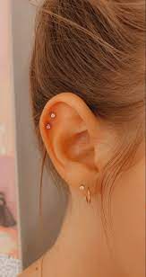 Auricular cartilage is located at the top of the ear, and it does not have blood vessels or nerve cells. Double Helix Piercing Pretty Ear Piercings Minimalist Ear Piercings Earings Piercings