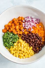 · 3 cups quinoa, cooked · 1 cup cucumber, diced · 1 red bell pepper, diced · 1 can corn, drained · 1 can black . Southwestern Quinoa Salad
