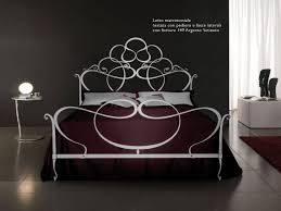 In this clean, lighter update, delicate oval finials nod to tradition and a rich charcoal powdercoat adds warmth and contemporary color. Wrought Iron Bed Ravel