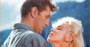 ROBERT MITCHUM DIRIGINDO MARILYN MONROE EM "O RIO DAS ALMAS PERDIDAS"