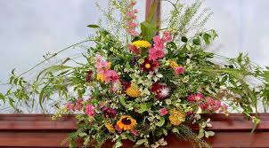 Making your own wedding bouquet needn't be a daunting proposition, especially if you're wanting a whimsical and rustic bouquet. Chichester Florist Wedding Flowers Specialist Driftwood Flowers
