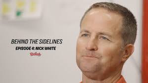 Behind the Sidelines"