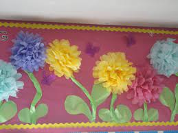 Chalkboard conversion i turned my chalkboard into a big bulletin board. —abbie l. Garden Classroom Theme Garden Theme Classroom Flower Bulletin Boards Paper Flower Backdrop Wedding