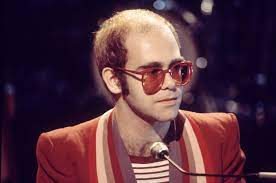 Stunning photos of legendary flamboyant superstar. At 70 Sir Elton John Still Has The Best Collection Of Glasses Ever Elton John Young Elton John Elton John Sunglasses