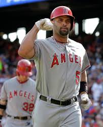 At the age of 21 albert pujols steps in for his second career at bat and proceeds to hit a monster game tying 2 run home run, like john rooney and mike shannon. Albert Pujols Justin Verlander And 12 Ways A Shortened Mlb Season Would Impact The History Books