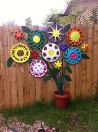 Wall Of Flowers Garden Decor Crafts Garden Art Diy Whimsical Garden Art
