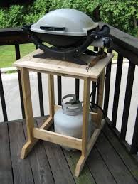 Grill Stand Fit For A Woodworker Finewoodworking Grill Stand Outdoor Kitchen Design Bbq Table