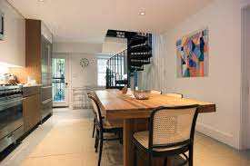 How can you redefine the house room with spiral staircases? The Base Of The Spiral Stair Is In The Kitchen And Dining Area On The Lower Floor Home Upstairs Bedroom Attic Bedroom