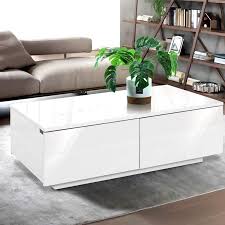 This coffee table with two generous storage drawers is a great way to corral items like toys, magazines, remotes and keep them out of sight, yet accessible. Artiss Modern Coffee Table 4 Storage Drawers High Gloss Wooden Furniture White Buy Coffee Tables 9350062203088