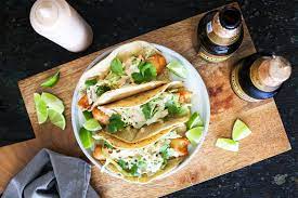 Baja Style Crispy Fish Tacos With Chipotle Crema Recipe Recipe Fish Tacos Appetizer Recipes Chipotle Crema