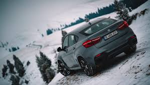 bmw x6 suits perfectly with frozen mountain roads of romania bmw x6 bmw new bmw