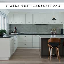 Piatra Grey Caesarstone Quartz Will Remind You Of A Soapstone With Its Gorgeous Natu Kitchen Cabinets Grey And White Custom Kitchen Cabinets Kitchen Cabinets