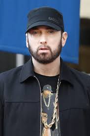 Why the hate ? Eminem is top 5 stop the cap